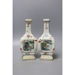 A pair of Chinese famille rose bottle vases, Qianlong marks, Republic period, 19cm tall