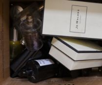 A collection of Jo Malone and Acqua Di Parma glass scent bottles