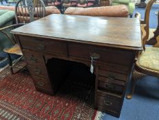 A late Victorian mahogany kneehole desk, length 107cm, height 80cm