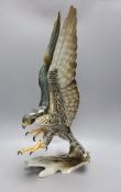 A large Hutschenreuther porcelain Peregrine falcon, 59cm