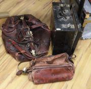 A large brown leather Gladstone bag, a Bally Italian brown leather satchel bag and a compatmental
