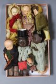 Seven 1940's small dolls