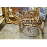 A small oak and pine twin seat cart, width 48cm, length 150cm
