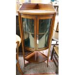 An Edwardian inlaid mahogany bow fronted standing corner cupboard, width 60cm, depth 44cm, height