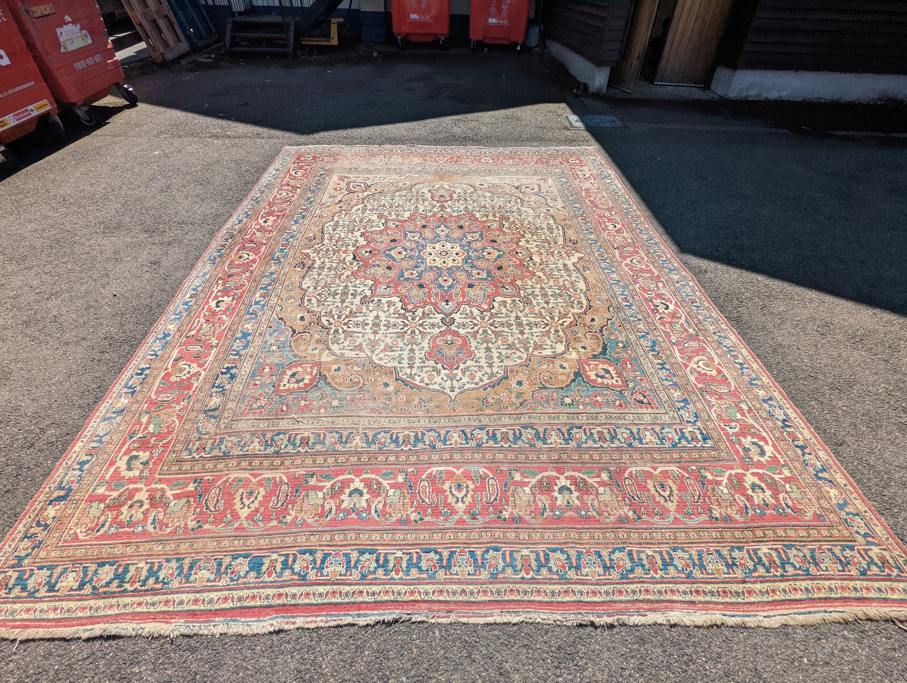 An Isfahan ivory ground carpet, 432 x 330cm