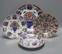 Four 18th century Dutch delft dishes, largest 30.5cm