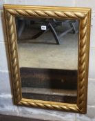 A gold painted gilt rope-twist mirror, width 57cm height 80cm