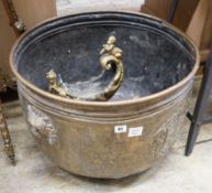 A large Dutch embossed brass circular log bin, diameter 63cm together with a gilt metal cornucopia