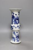 A 19th century Chinese blue and white beaker vase - 27cm tall