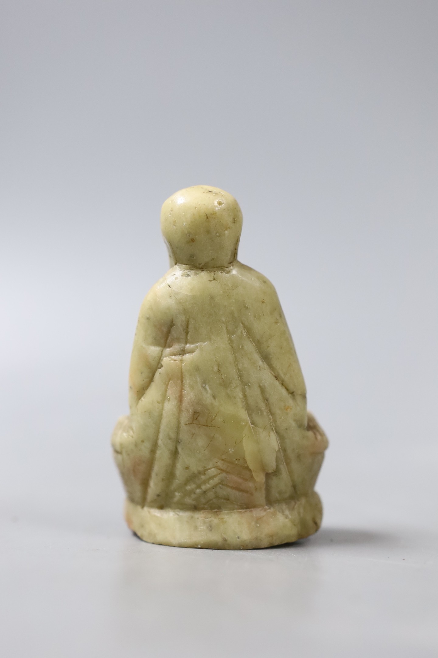 A carved soapstone figure of a seated smiling Buddha - 8cm tall - Image 2 of 3