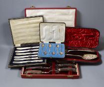 Four cased sets of flatware, including silver 'berry spoons', tea knives, teaspoons and horn handles