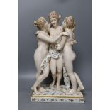 A large German porcelain figure group, the Three Graces, 49cm