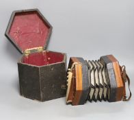 A cased Lachanel & co. 21 button concertina, 106301 - box is 18cm high