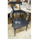 A contemporary ebonised Windsor chair