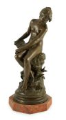Auguste Moreau (French, 1834-1917). A bronze figure of a nude girl seated on a mound holding a