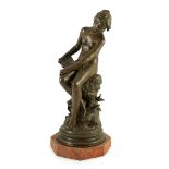 Auguste Moreau (French, 1834-1917). A bronze figure of a nude girl seated on a mound holding a