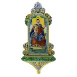 A Cantagalli maiolica holy water stoop, late 19th century/early 20th century, The arched back