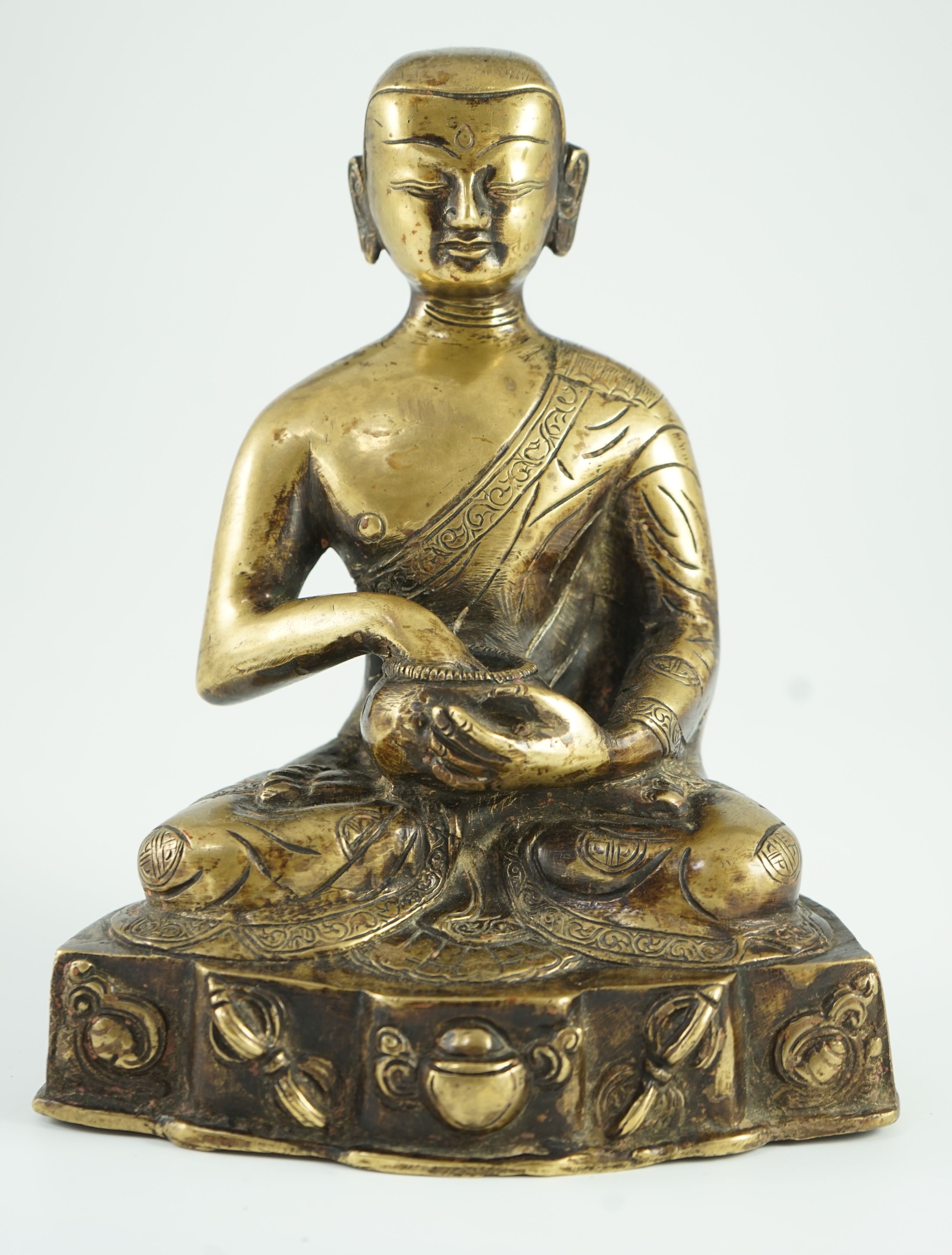 A Himalayan bronze figure of Buddha, 19th century, the seated figure holding an alms bowl, the - Image 2 of 6