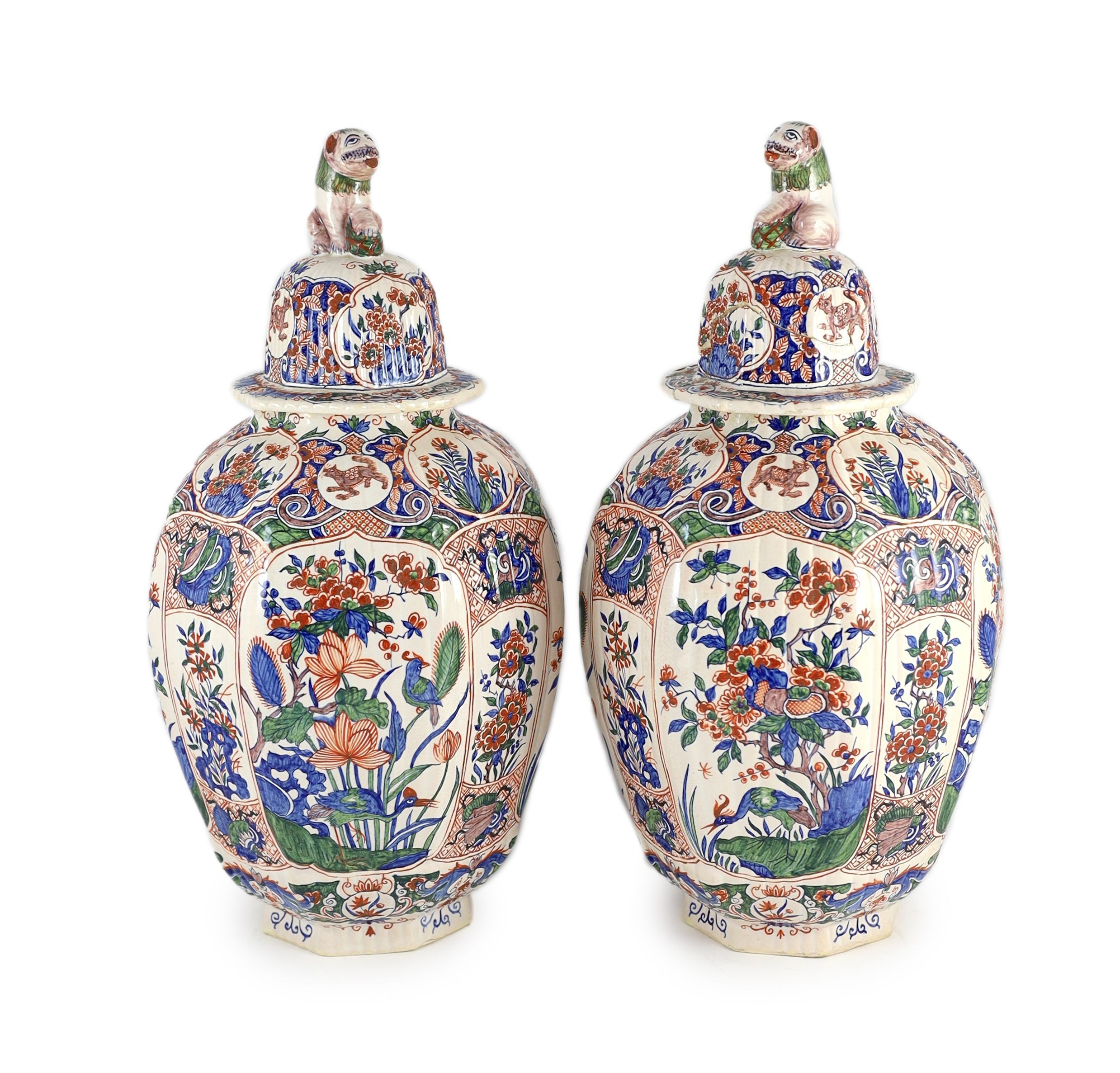 A pair of large Delft jars and covers, Pieter Kocx factory De Grieksche A, c.1701-1722, each of