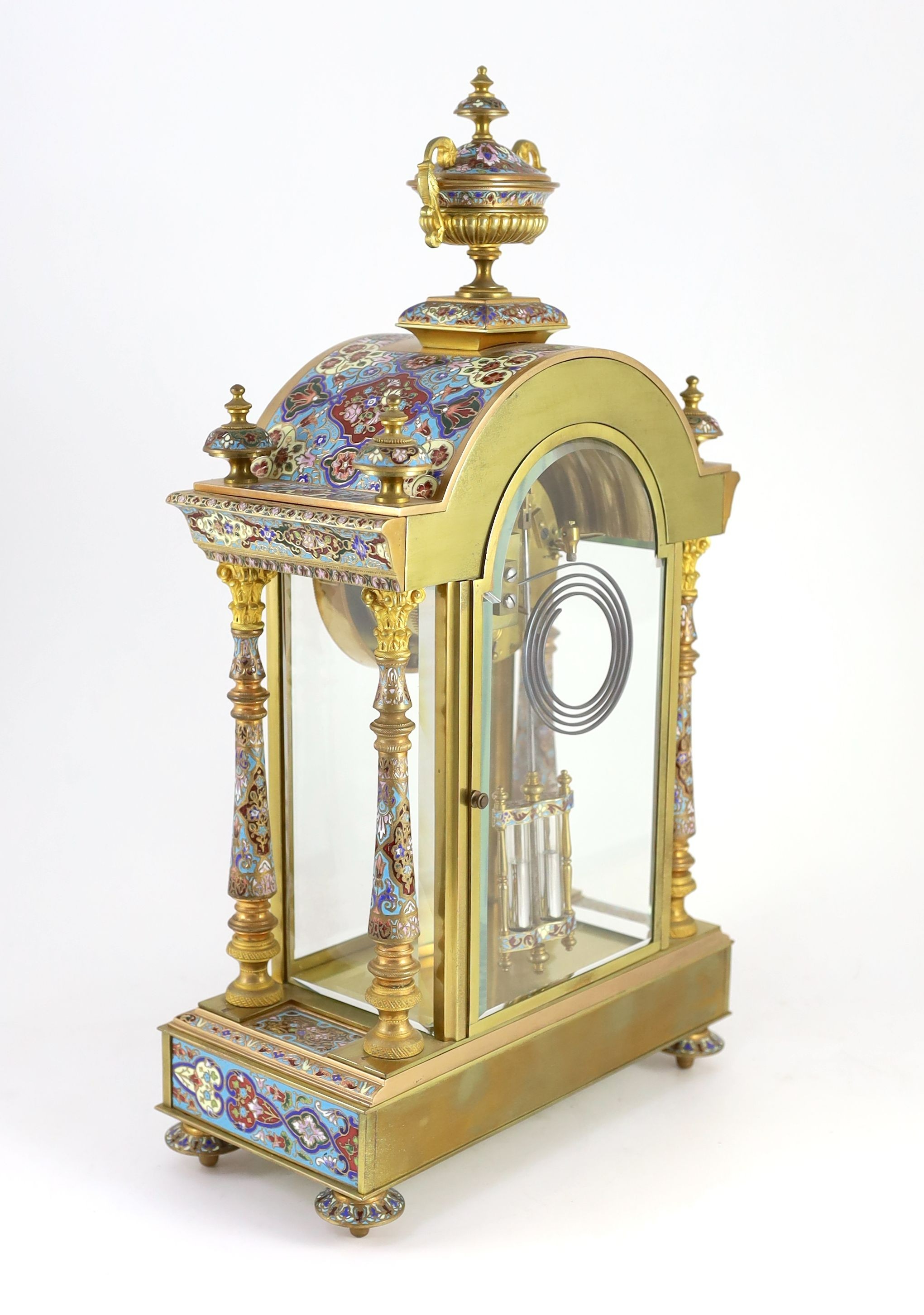 An early 20th century French ormolu and champleve enamel clock garniture, the mantel clock of - Image 4 of 6