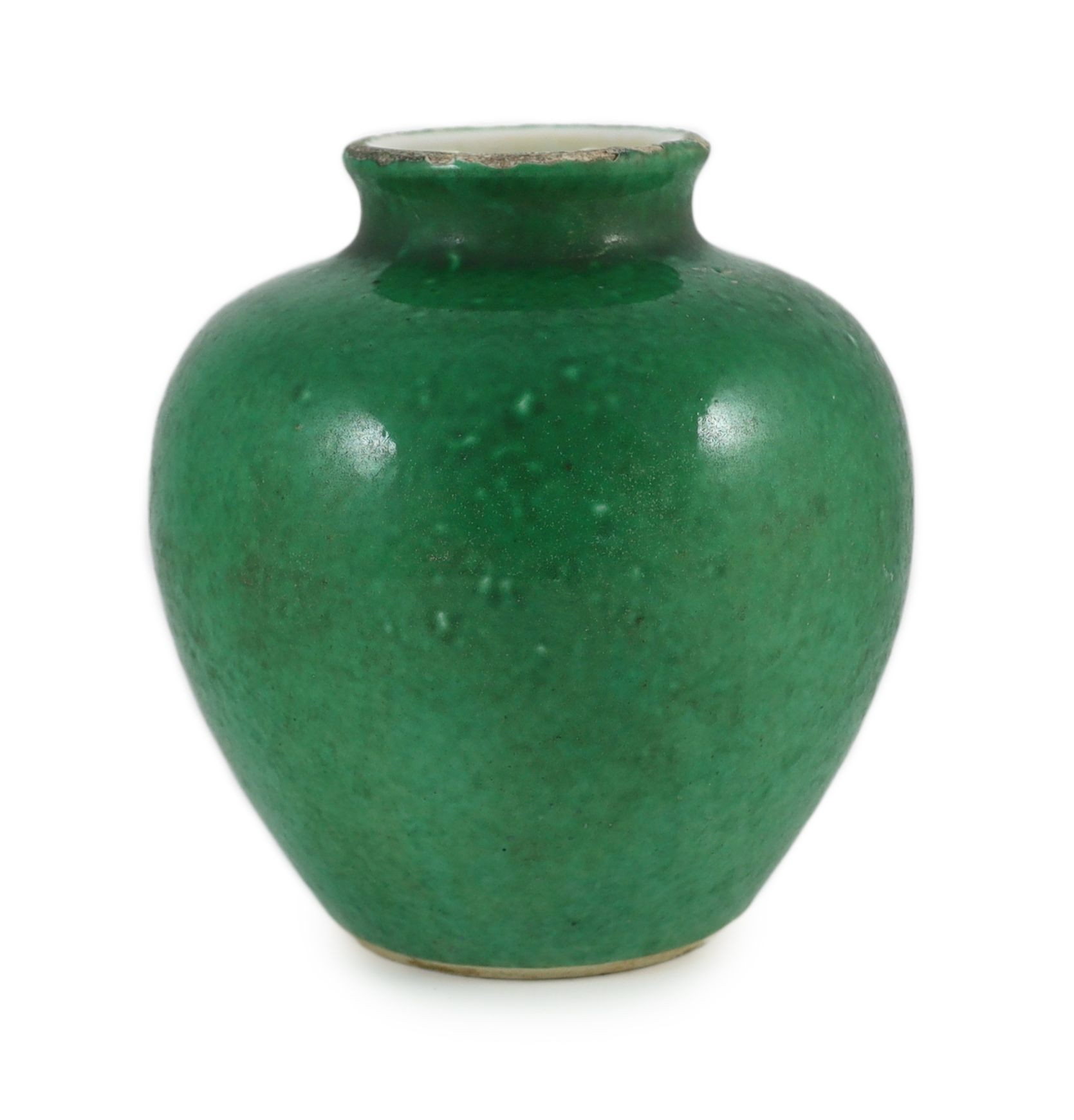 A Chinese green glazed ovoid jar, 18th/19th century on a ring shaped unglazed foot, 21.5cm