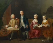 Manner of Arthur Devis (1712-1787) Family portrait, interior with a gentleman seated at a writing