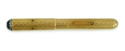 A late 1930's 18ct gold cased and sapphire and diamond set side lever fountain pen, with Dunhill