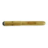 A late 1930's 18ct gold cased and sapphire and diamond set side lever fountain pen, with Dunhill