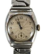 A gentleman's late 1920's silver cushion cased Rolex manual wind wrist watch, with sunburst Arabic