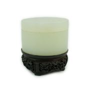 A Chinese pale celadon jade cylindrical box and cover, 18th/19th century, the stone of good even