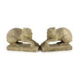 A pair of 19th century carved marble models of crouching cats, width 32cm, depth 12cm, height