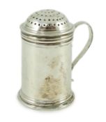 An early George I silver kitchen pepper, no maker's mark, with engraved crest, date letter only