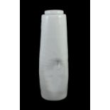 § § Edmund de Waal (b.1964) a tall dimpled porcelain lidded vase, c.1993, covered in a pale
