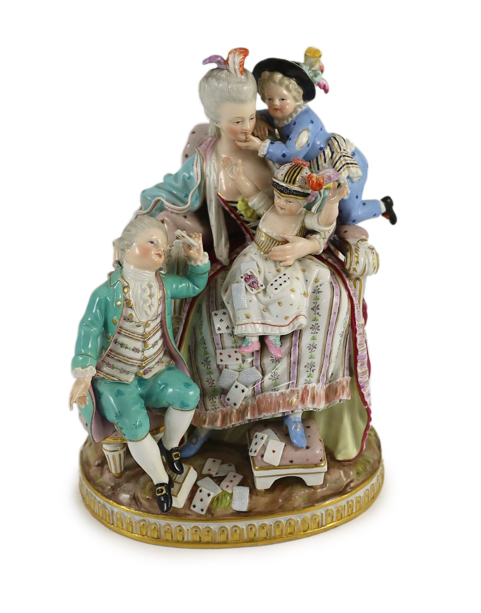 A Meissen group of the good mother, 19th century, after a model by Michel Victor Acier, blue crossed