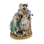 A Meissen group of the good mother, 19th century, after a model by Michel Victor Acier, blue crossed