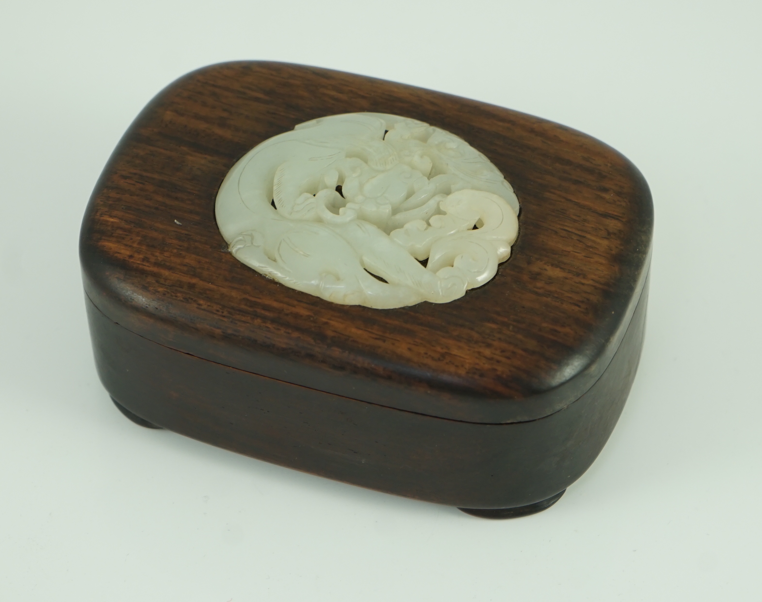 A Chinese white jade openwork plaque, 17th/18th century, later inset into a hongmu box the plaque - Image 2 of 4