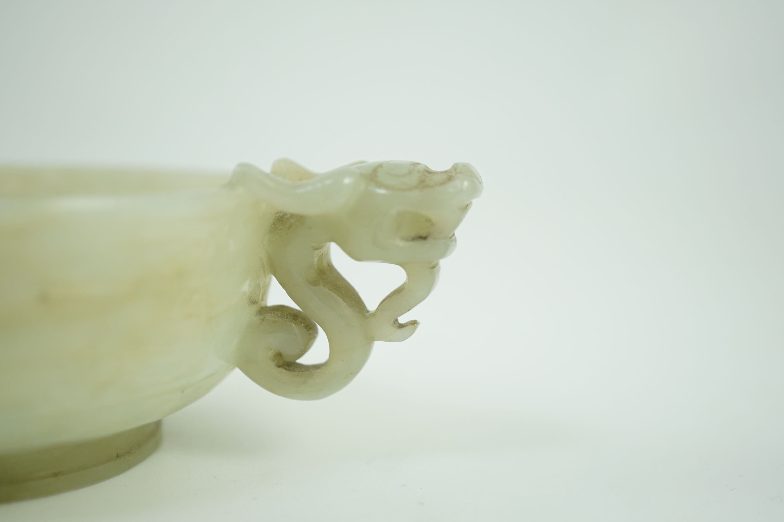 A Chinese pale celadon jade two handled ‘chilong’ cup, 17th/18th century, with a pair of carved - Image 9 of 10