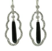 A pair of 20th century white gold, black onyx and diamond cluster set drop earrings, of shaped