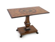A 19th century Dutch walnut and marquetry tilt top centre table the rectangular top with central