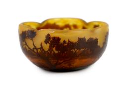 A Daum cameo glass ‘dusk river landscape’ bowl, c.1905, of quatrefoil form, decorated with trees and