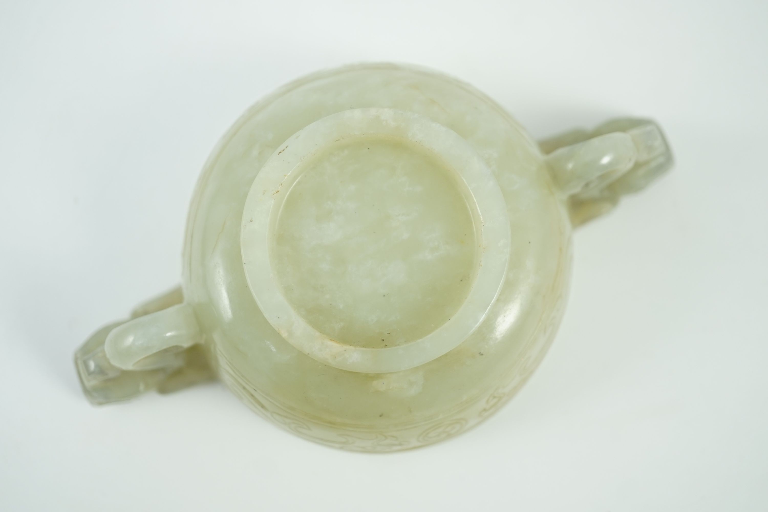 A Chinese pale celadon jade two handled ‘chilong’ cup, 17th/18th century, with a pair of carved - Image 10 of 10