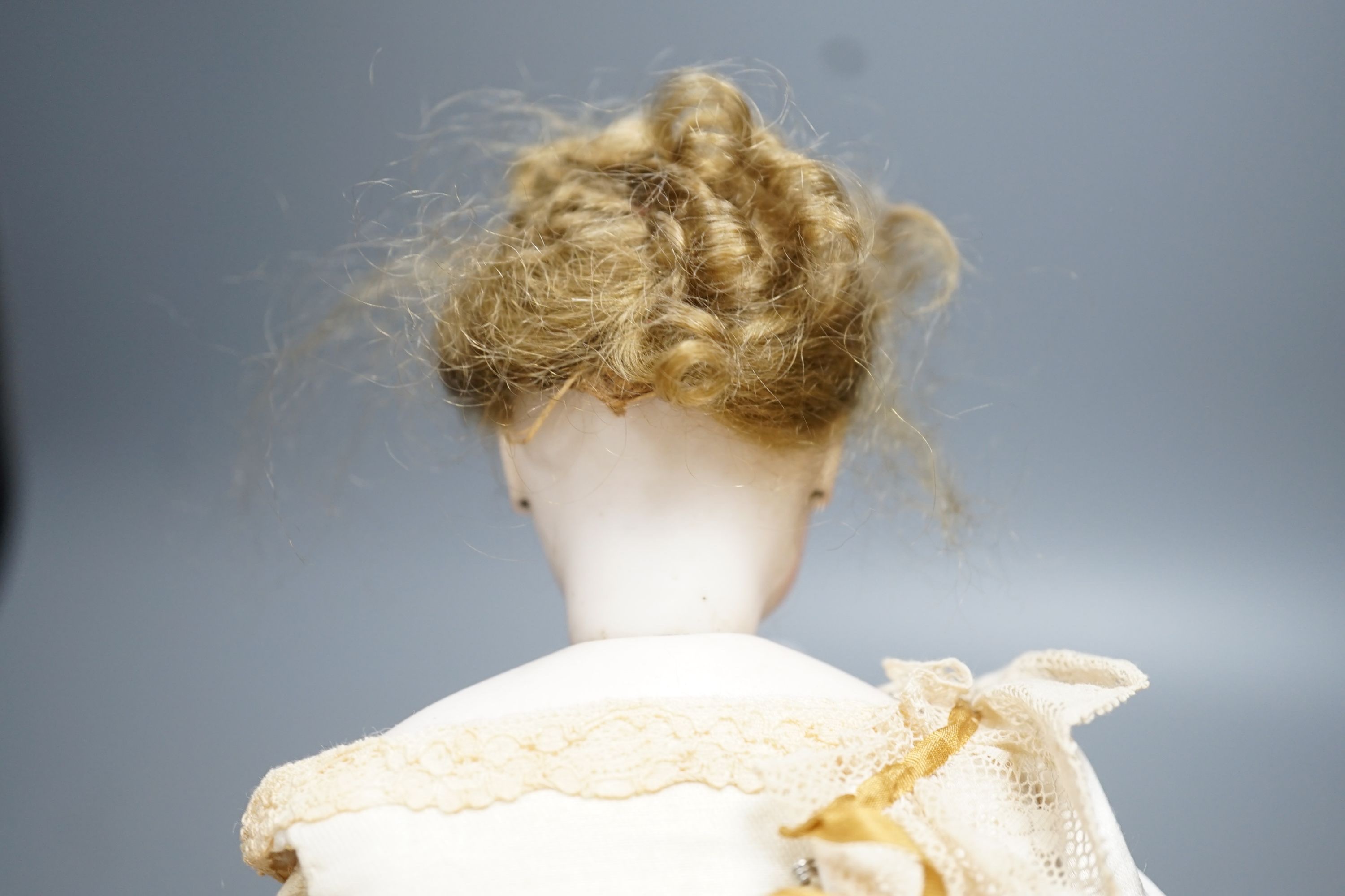 An S.G. bisque shoulder head French fashion doll c.1875, cork pate mohair wig attached, swivel neck, - Image 6 of 11