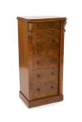 A Victorian figured walnut secretaire Wellington chest, with scroll carved brackets, five drawers