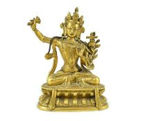 A Tibetan gilt bronze seated figure of Vajrasattva, finely cast and gilded, 16.5 cm highGood