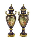 A pair of Sevres style porcelain and ormolu mounted vases, late 20th century, each decorated with