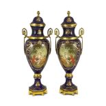 A pair of Sevres style porcelain and ormolu mounted vases, late 20th century, each decorated with