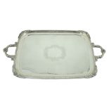 A 1930' silver two handled tea tray, by Walker & Hall, or rounded rectangular form, with gadrooned