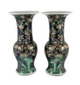 A pair of large Chinese famille noire yen-yen vases, six character Kangxi marks but 19th century,