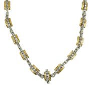 A 20th century two colour gold and diamond set necklace, with textured yellow gold links, 42cm,