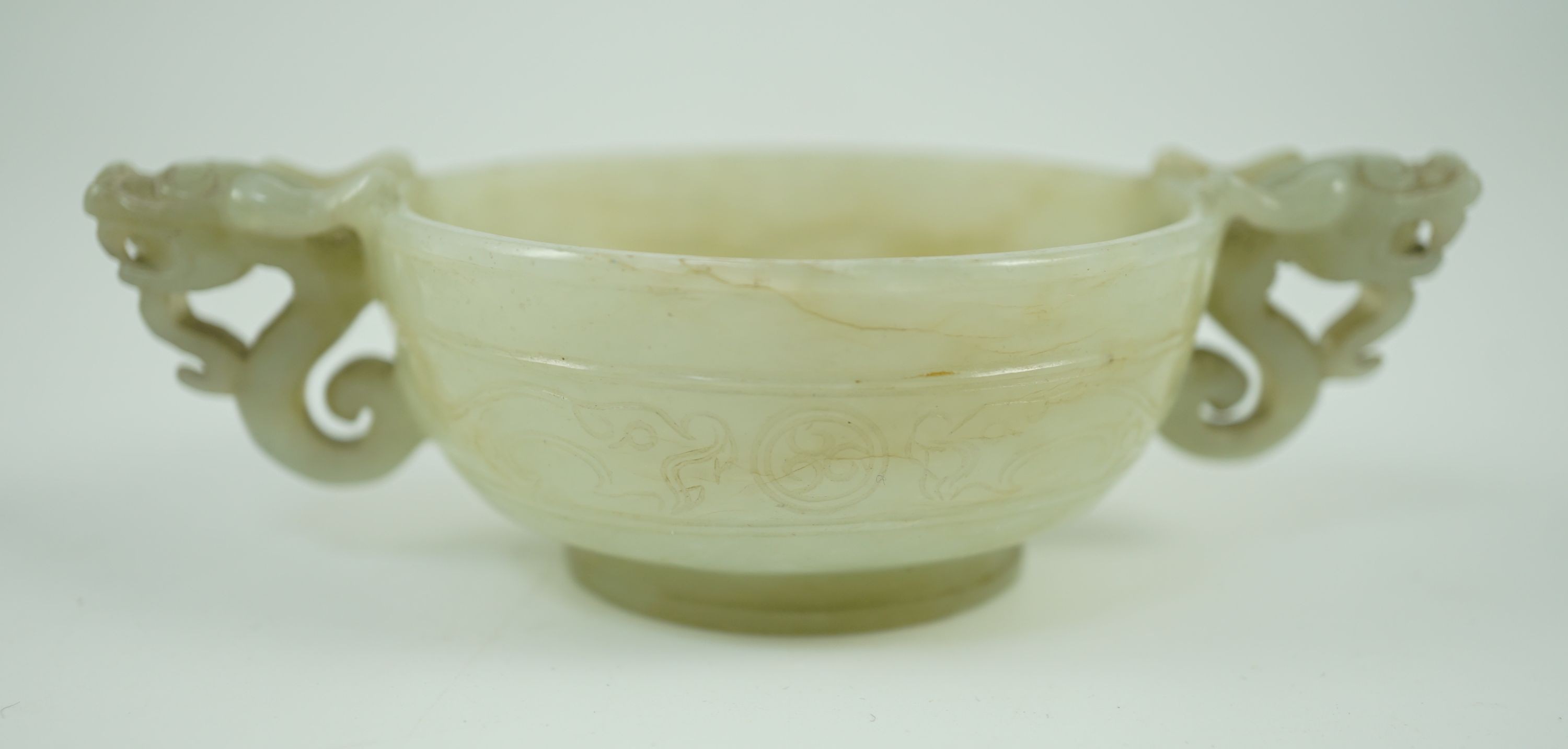 A Chinese pale celadon jade two handled ‘chilong’ cup, 17th/18th century, with a pair of carved - Image 8 of 10